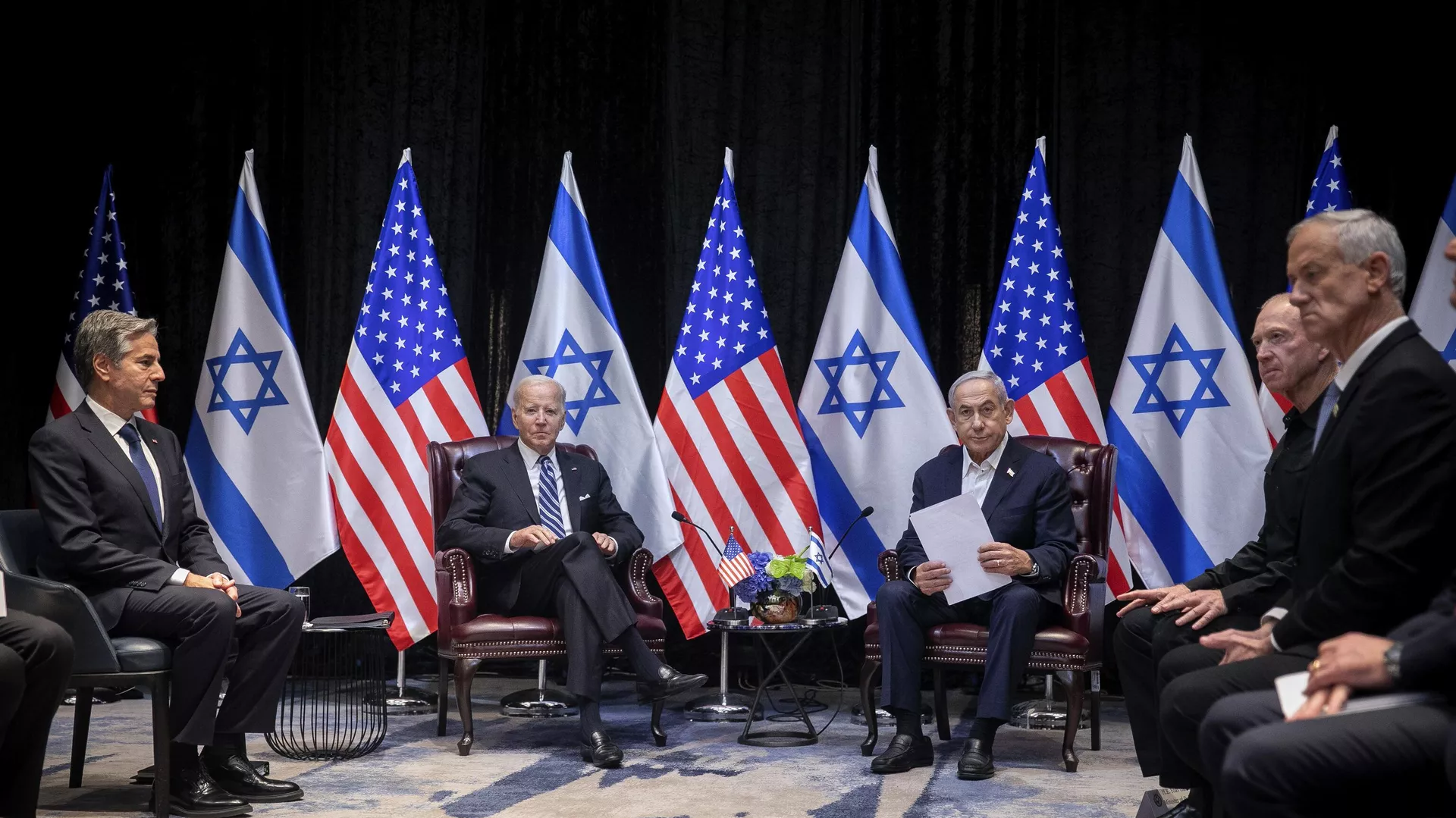 U.S. President Joe Biden, center left, pauses during a meeting with Israeli Prime Minister Benjamin Netanyahu, center right, in Tel Aviv, Israel, Wednesday, Oct. 18, 2023