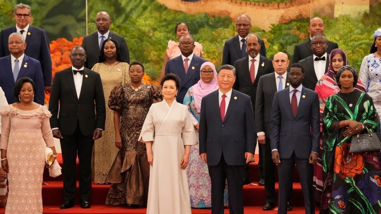 China's President Xi Jinping (c) stands with leaders from African nations ahead of the dinner reception of the 2024 Summit of the Forum on China-Africa Cooperation (FOCAC) at The Great Hall of People on September 4, 2024 in Beijing, China