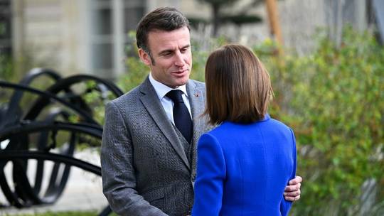 France's President Emmanuel Macron (L) with Moldova's President Maia Sandu (R) ahead of a meeting at the Elysee Palace in Paris, on March 7, 2024