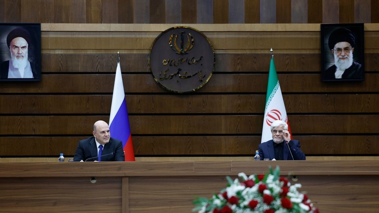 Russian Prime Minister Mikhail Mishustin(L) and Iranian Vice President Mohammad Reza Aref in Tehran, Iran on September 30, 2024