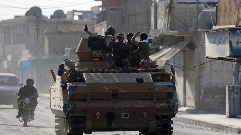 US troops ‘leave’ Kobani as Turkish incursion advances and Kurds make deal with Damascus